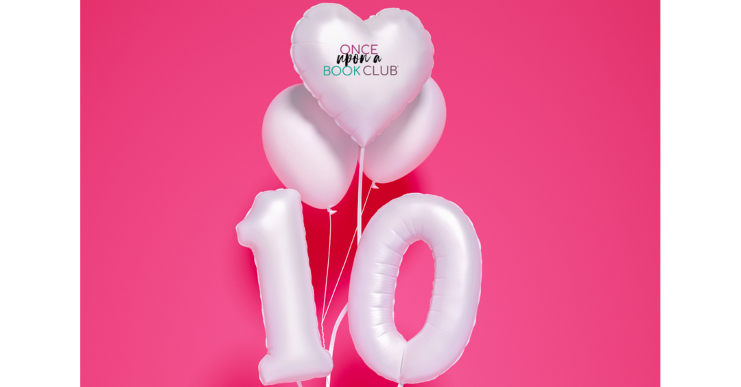 White heart and number 10 balloons celebrate Once Upon a Book Club's 10th anniversary against a bright pink background.