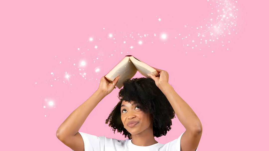 A young woman holding an open book above her head, looking thoughtful with sparkling effects on a pink background.