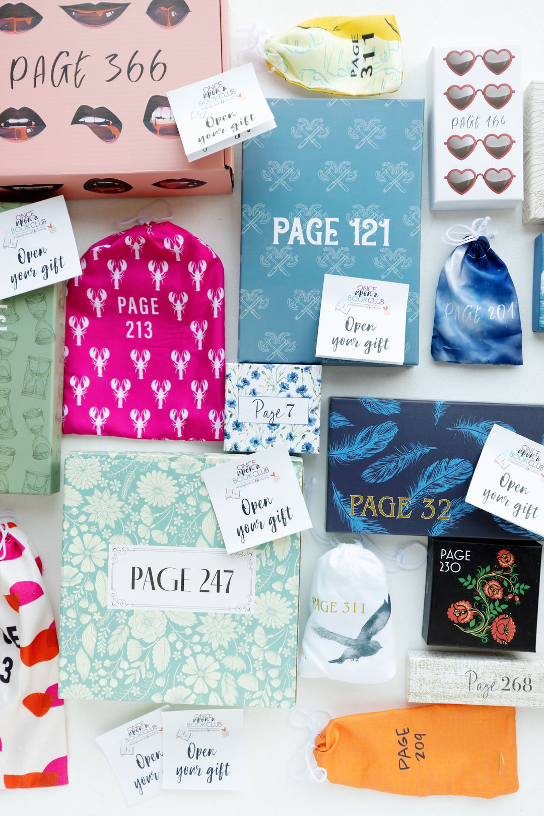 Collection of colorful boxes with 'Open to see gift' tags and page number labels.