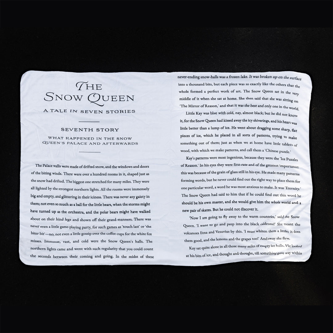 The reverse side of the Snow Queen Blanket showing the Seventh Story book pages.