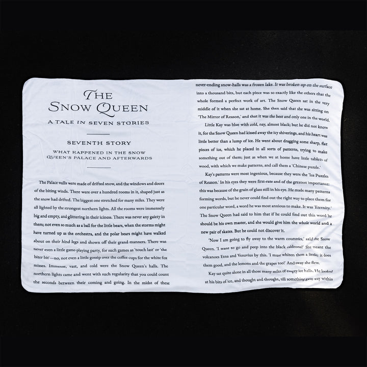 The reverse side of the Snow Queen Blanket showing the Seventh Story book pages.