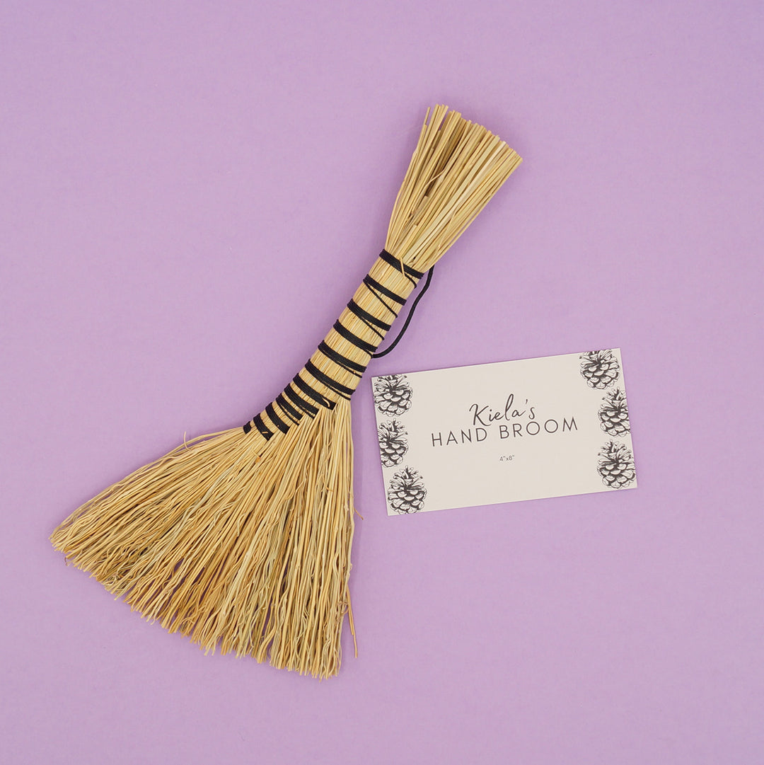 a small hanging broom perfect for display