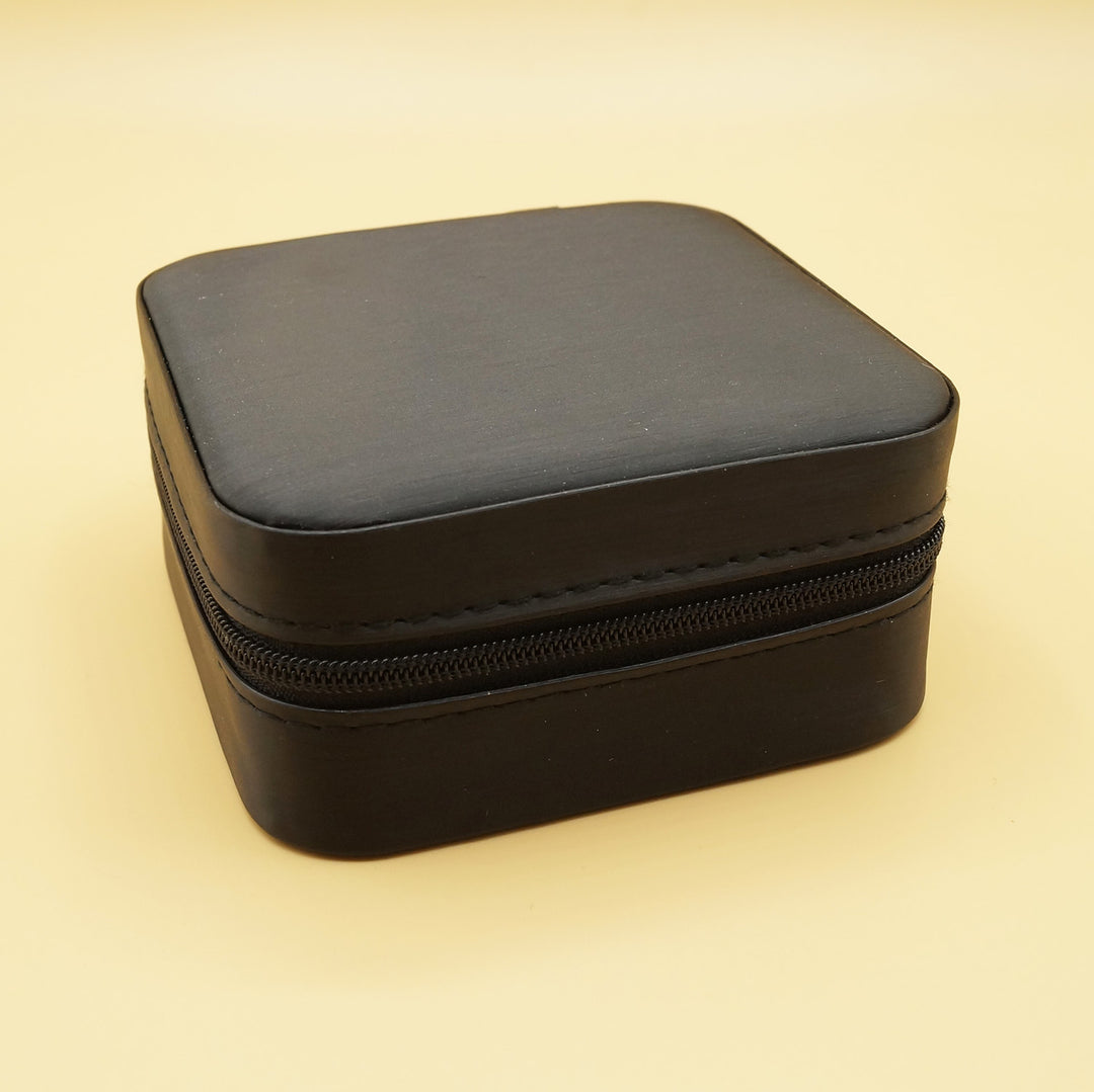 a closed black travel jewelry box