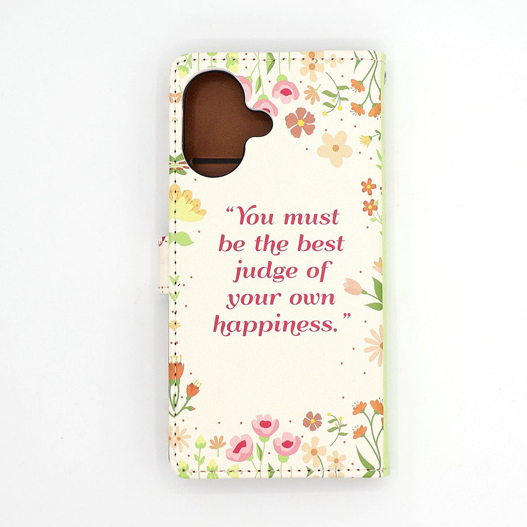 Phone case with floral design and motivational quote on a white background