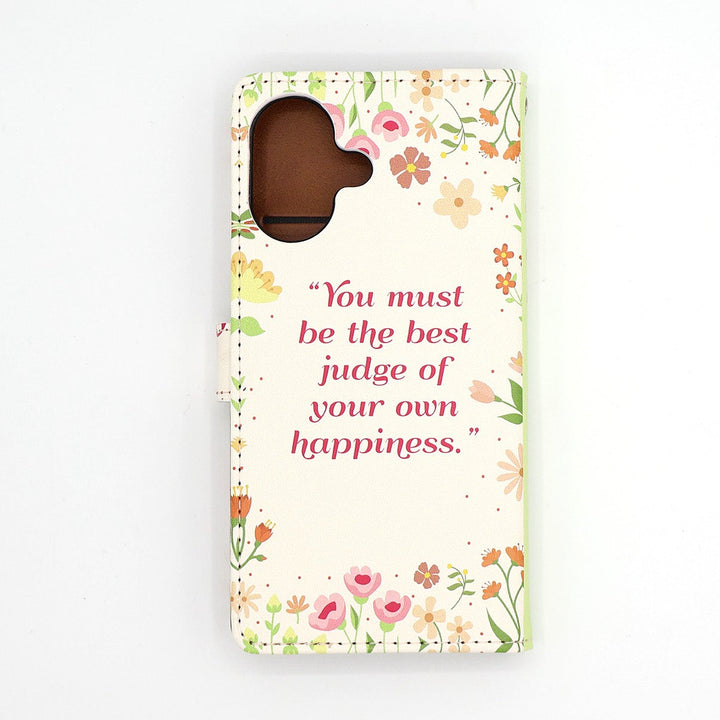 Phone case with floral design and motivational quote on a white background