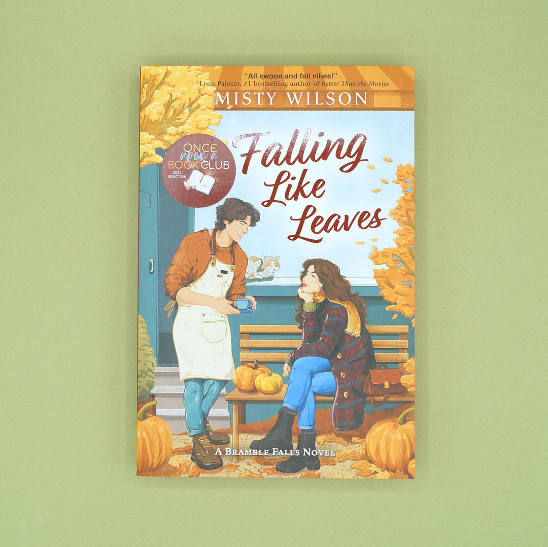 Book cover of 'Falling Like Leaves' by Misty Wilson on a green background