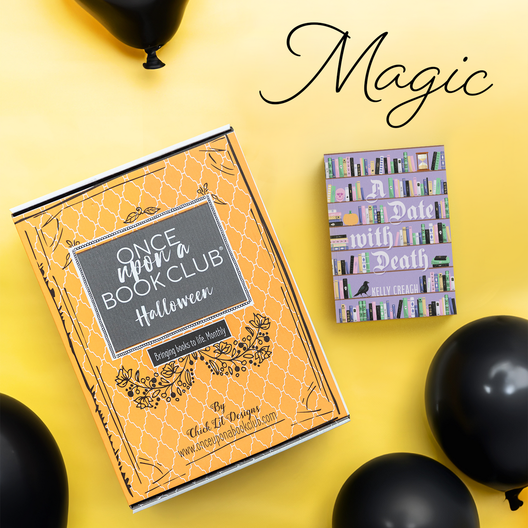 Magic! An orange OUABC Halloween box lays against a yellow background with black balloons. Next to the box is a hardcover special edition of A Date With Death by Kelly Creagh with a light purple bookshelf background on the cover.