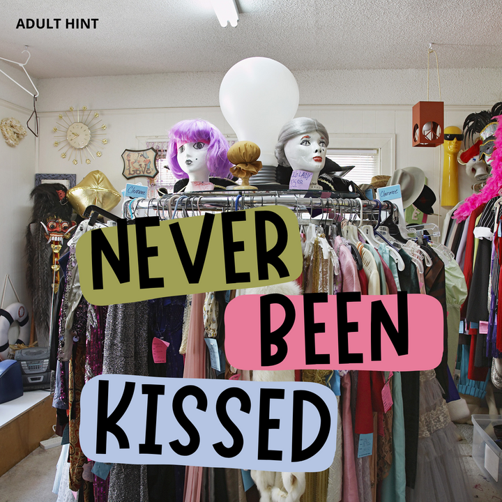 An eclectic thrift shop with a variety of clothing and accessories in a range of styles and colors. The words "Never Been Kissed" are written across the lower middle of the image. The words "Adult Hint" are in the upper left corner.