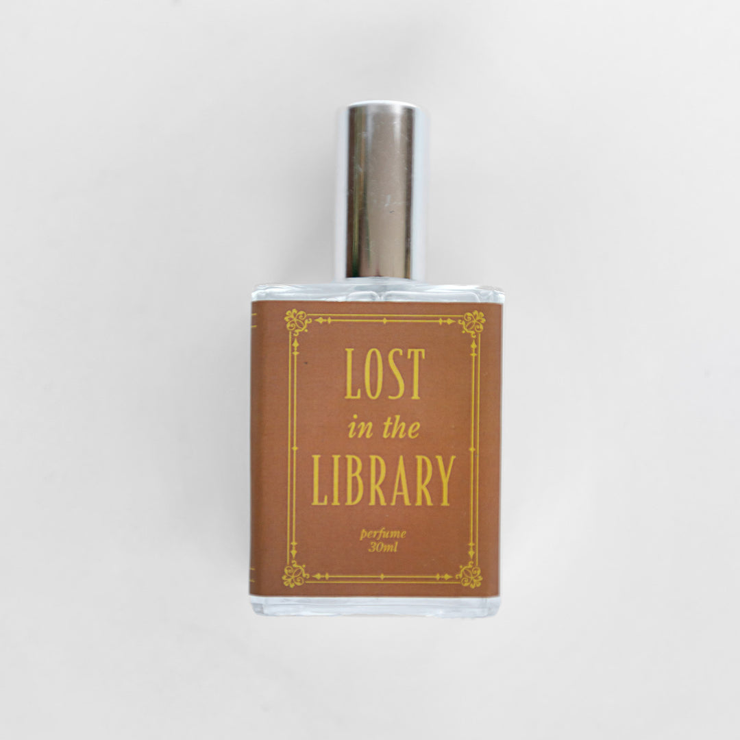 A closeup of the bottle containing the fragrance "Lost in the Library".