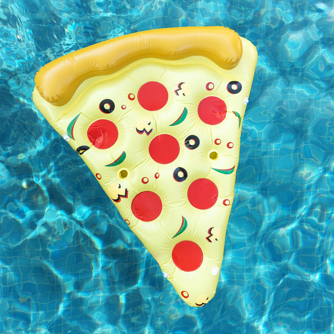 A large pizza-shaped pool floatie lays in a pool with pepperoni and olive icons on it.