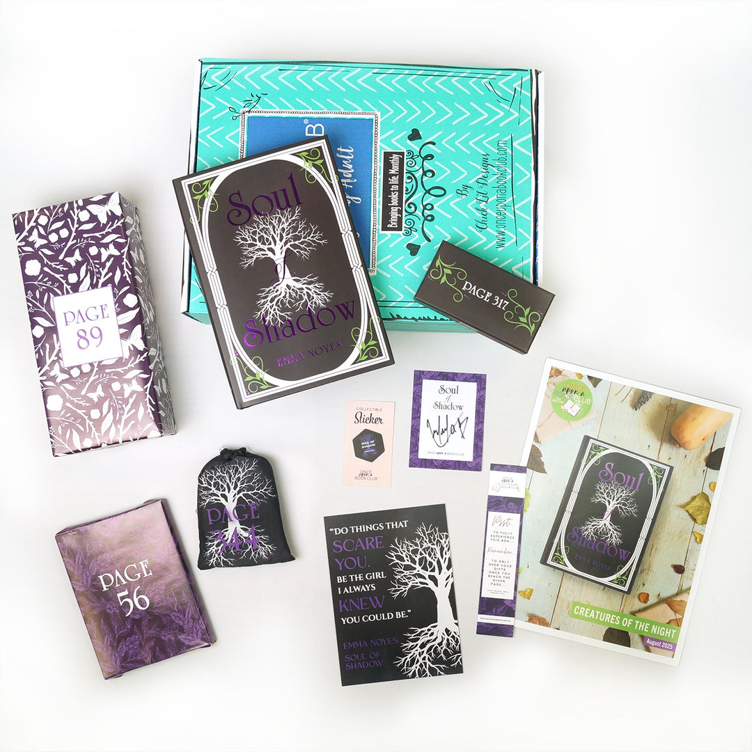 A hardcover copy of Soul of Shadow by Emma Noyes surrounded by wrapped gifts labeled with page numbers and paper items.