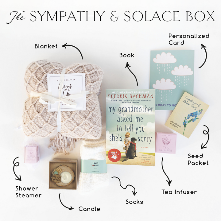 The Sympathy & Solace Box: A copy of My Grandmother Asked Me to Tell You She's Sorry by Fredrik Backman, a pack of Forget-Me-Not Seeds, a tea infuser, a pair of socks, a candle, a shower steamer, a blanket, and a personalized card.