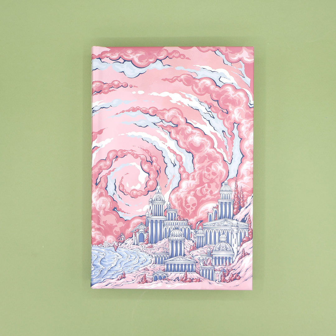 A closed copy of 'The Wicked Sea' without the dust jacket featuring artwork of a cityscape with pink clouds on a green background