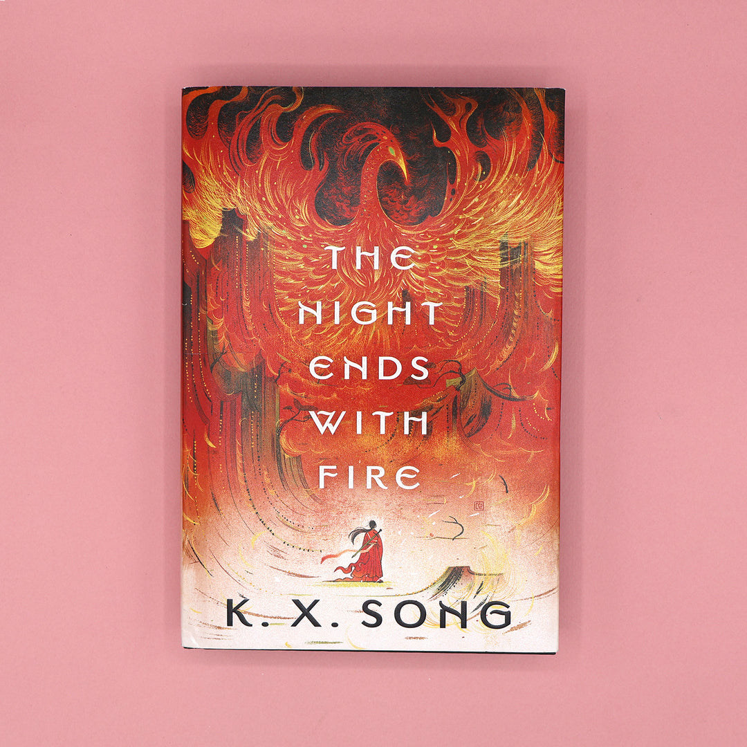 Book cover of 'The Night Ends with Fire' by K.X. Song on a pink background