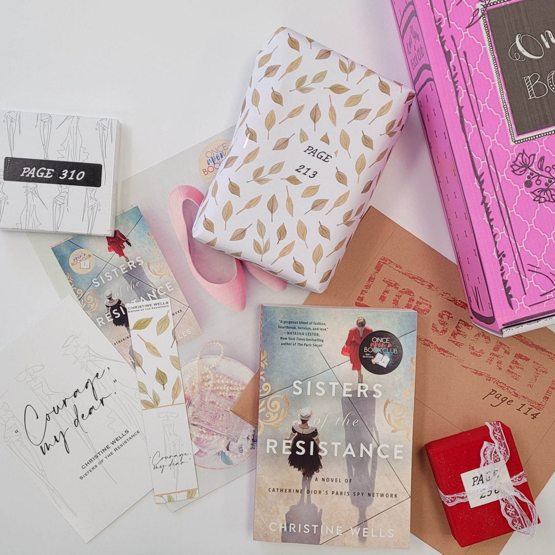 from left to right - a white square box, quote card, bookmark, bookclub kit, white and gold box, paperback edition of Sisters of the Resistance, brown folder labeled Top Secret, red square box, and pink Once Upon a Book Club box. The boxes all have page numbers.