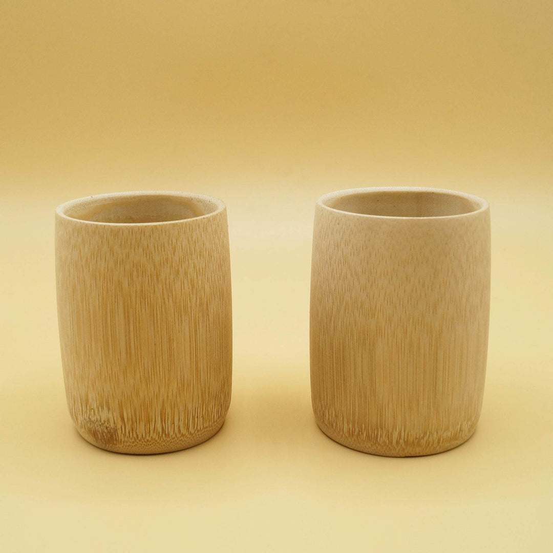 a pair of wooden cups